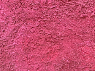 abstract beetroot color plaster wall
