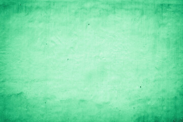 Fototapeta na wymiar Plain green old rough cement wall texture. Abstract grunge concrete background for pattern.