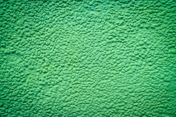 Green rough cement wall texture. Abstract grunge concrete background for pattern.
