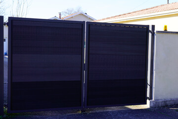 Aluminum black high door steel dark gray metal gate of house street portal of suburb home