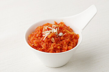 Gajar ka halwa is a carrot-based sweet dessert pudding from India. Garnished with Cashew/almond nuts 