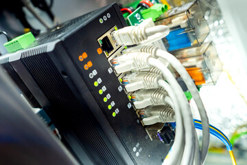 Network hardware. Computer network concept. Wires are connected to network equipment. Ethernet...