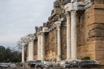 Fototapeta premium An antique ruined city of columns.Ruin. View of the ancient city in Side, Turkey.