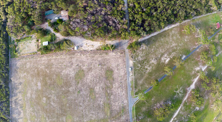 Birds-eye-view of field and road