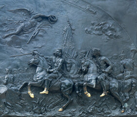 Bas-relief on the pedestal of the monument to Peter the Great in front of Saint Michael's Castle, Saint Petersburg, Russia. The bas &ndash; relief depicts a scene of the Battle of Poltava in 1714