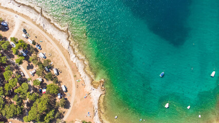 Aerial drone view of ocean sea coast at summertime tourist seaso