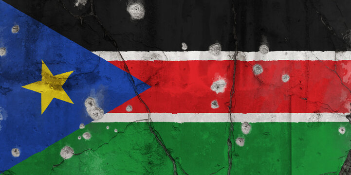 Full Frame Photo Of A Weathered Flag Of South Sudan Painted On A Cracked Wall With Bullet Holes. Crisis And Civil War In South Sudan Concept.