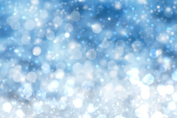 Abstract blurred festive winter christmas or Happy New Year background with shiny blue and white bokeh lighted snow landscape. Space for your design. Card concept.