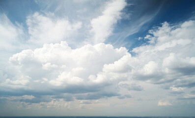 Naklejka na ściany i meble Big white cloud on blue sky