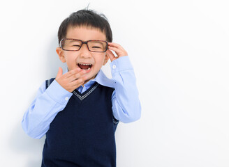 Happy Kid boy holding glasses and having fun