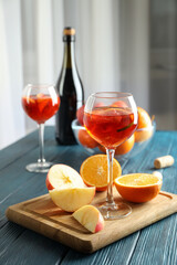 Concept of alcohol drink with Sangria on wooden table