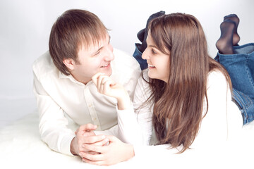Family Values Concepts. Caucasian Loving Happy Couple Posing Touching Chin Closely Together Over White Background.