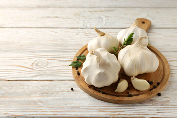 Concept of cooking with garlic, space for text