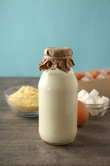 Ingredients for pie or cake cooking on wooden table