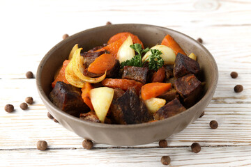 Concept of tasty food with beef with vegetables, close up