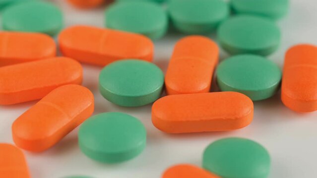 colorful pills - Opioid and prescription medication addiction epidemic or crisis - concept