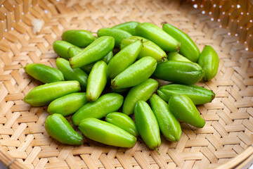 Bilimbi fruit in bamboo basket