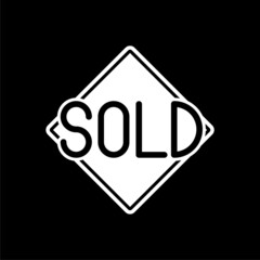Sold sign isolated on dark background