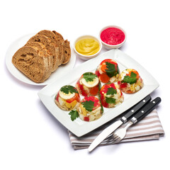 Portion of delicious chicken aspic on a plate isolated on white background