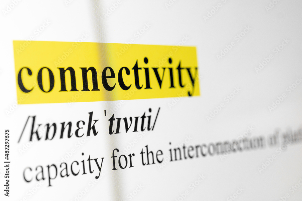 Poster connectivity text macro shot highlighted in yellow color on computer screen