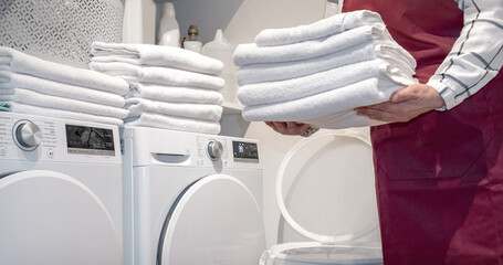 wash dry towel worker laundry washing machine hotel