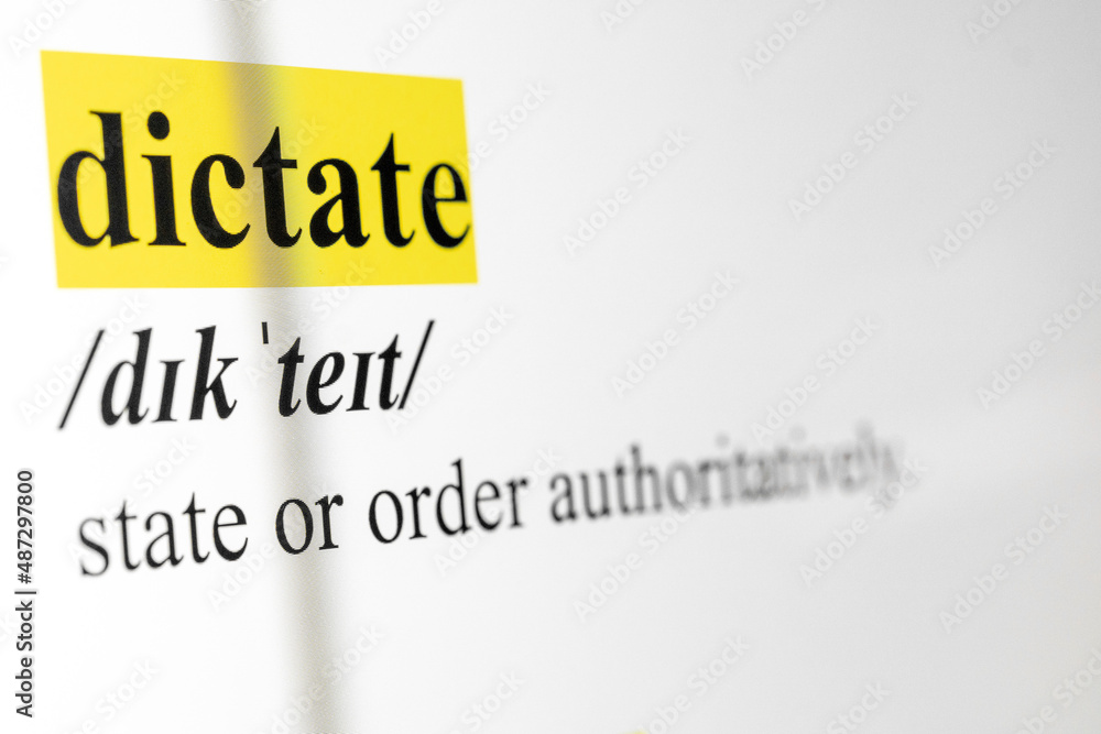 Poster dictate text macro shot highlighted in yellow color on computer screen