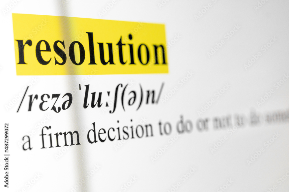 Poster Resolution Text Macro Shot Highlighted in Yellow Color On Computer Screen