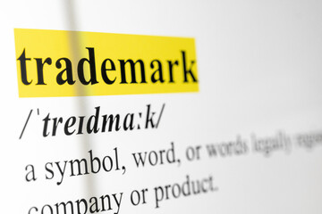 Trademark Text Macro Shot Highlighted in Yellow Color On Computer Screen