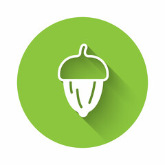 White Acorn icon isolated with long shadow. Green circle button. Vector