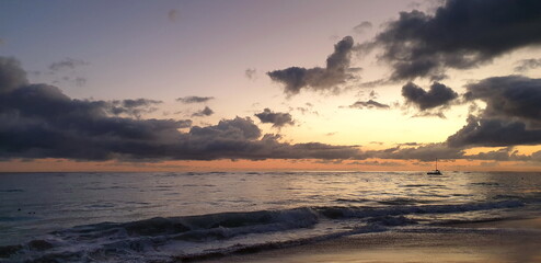 Naklejka na ściany i meble Sunrise on the Beach. Rising sun, and Atlantic Ocean