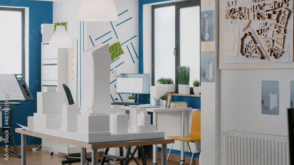 Poster empty office with building model and tools to design construction layout for urban project. nobody i