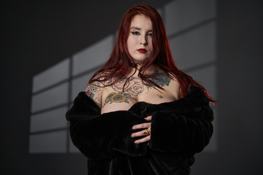 Redhead plus size woman in lingerie