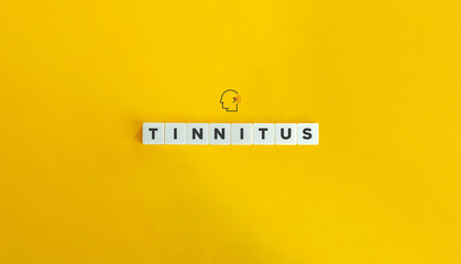 Tinnitus Word Letter Tiles on Yellow Background. Minimal Aesthetics.