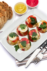 Portion of delicious chicken aspic on a plate isolated on white background
