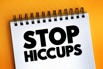 Stop Hiccups text on notepad, concept background
