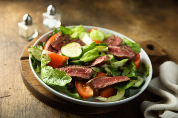 Fresh vegetable salad with beef steak