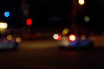 Bokeh blurred car lights at night. Abstract background