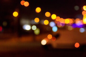 Bokeh blurred car lights at night. Abstract background