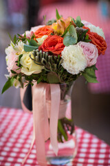 wedding flowers on the table in the restaurant