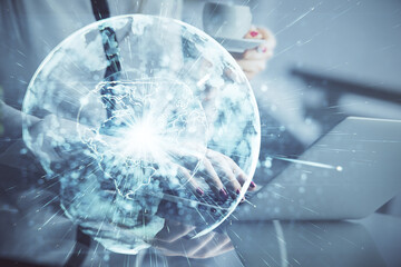 Multi exposure of woman hands typing on computer and business theme hologram drawing. Success...