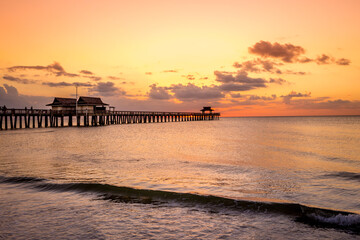 pier jetty at sunset in Naples, forida, usa