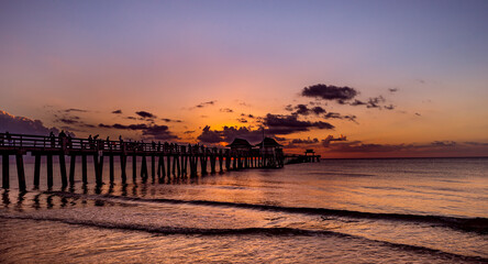 Fototapeta premium pier jetty at sunset in Naples, forida, usa