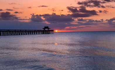 pier jetty at sunset in Naples, forida, usa