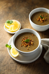 Traditional homemade lentil soup with lemon