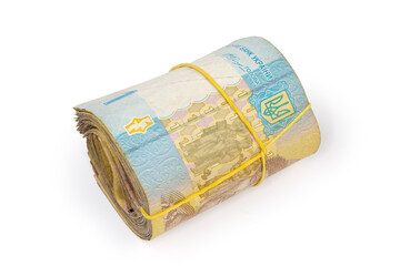 Bundle of shabby banknotes denominations one Ukrainian hryvnia rolled up