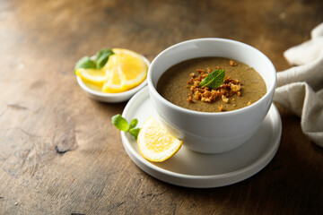 Traditional homemade lentil soup with lemon