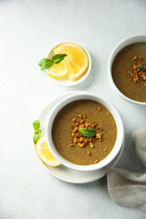 Traditional homemade lentil soup with lemon