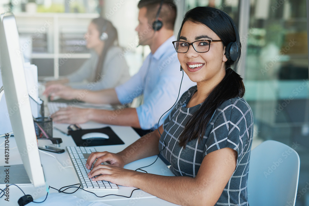 Aufkleber resolving client issues with confidence. portrait of a happy and confident young woman working in a 