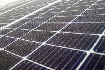 solar panels captured in icing conditions. The concept of the efficiency of photovoltaic cells in...