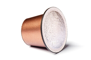 Coffee in a capsule for a coffee machine. White background.